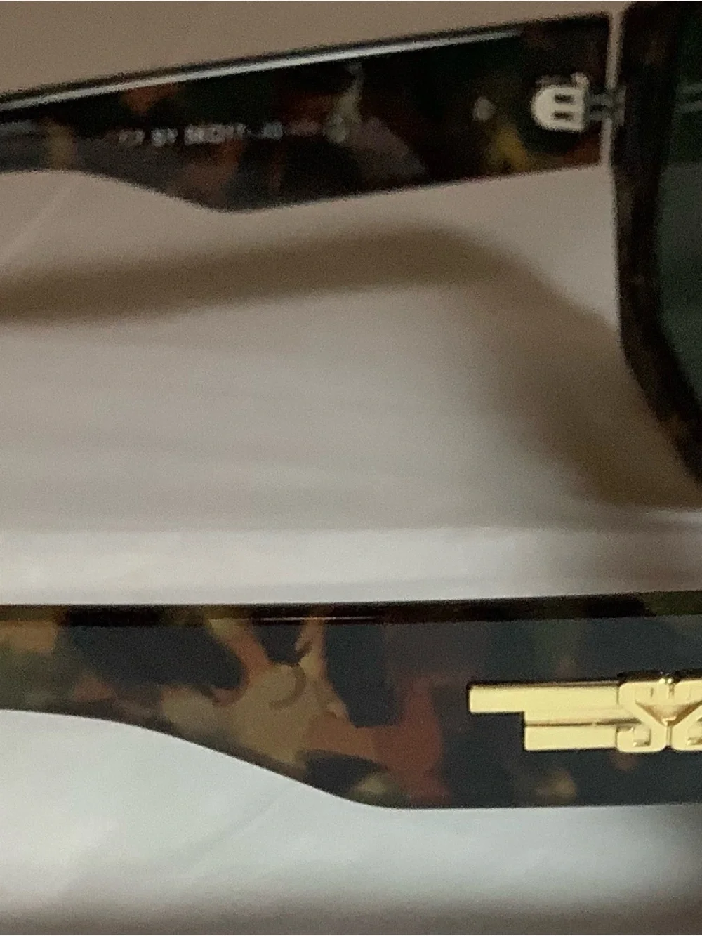 Geometric polarized square double bridge sunglasses by Sojo.